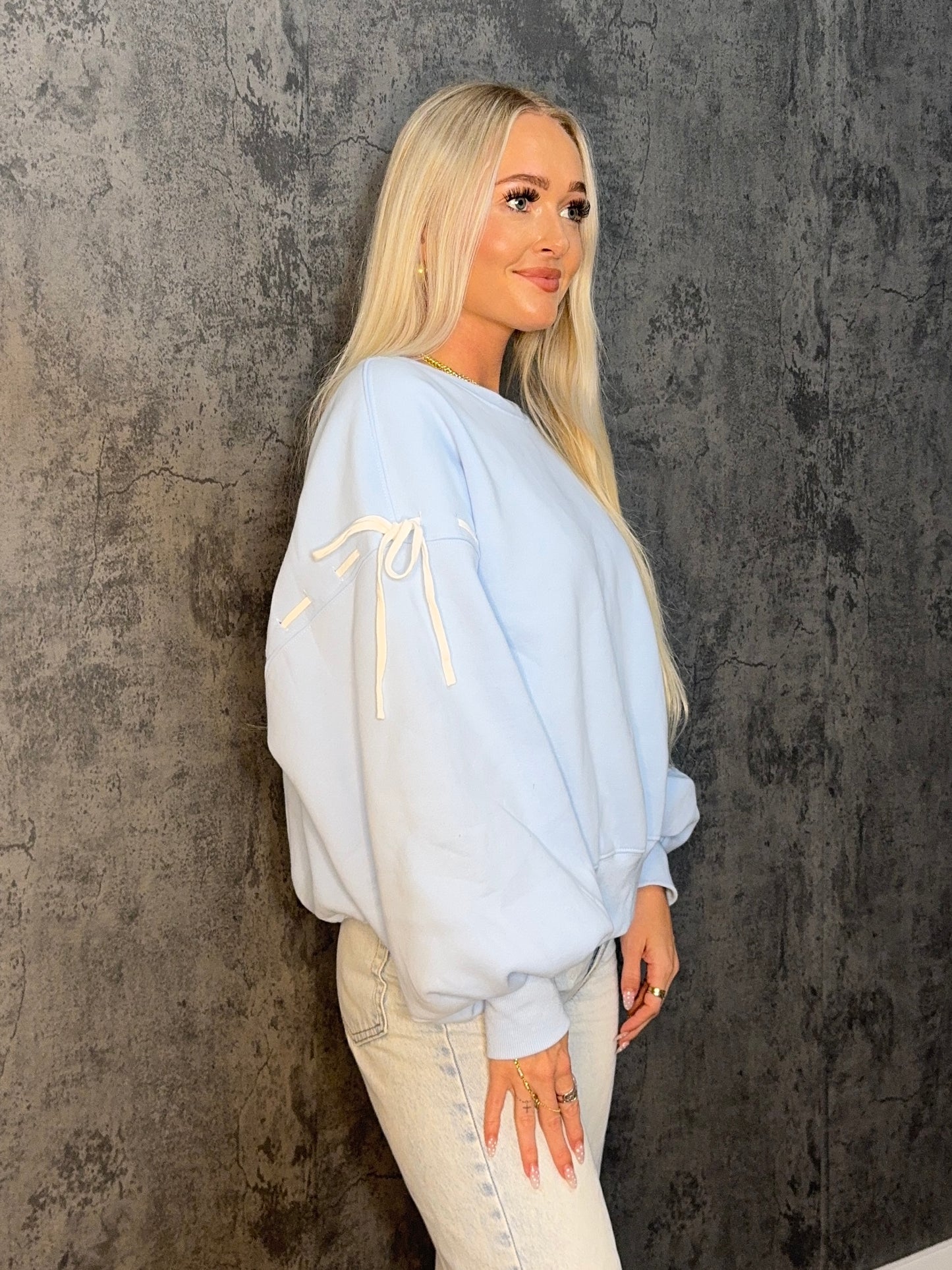 Blue with white bows pullover